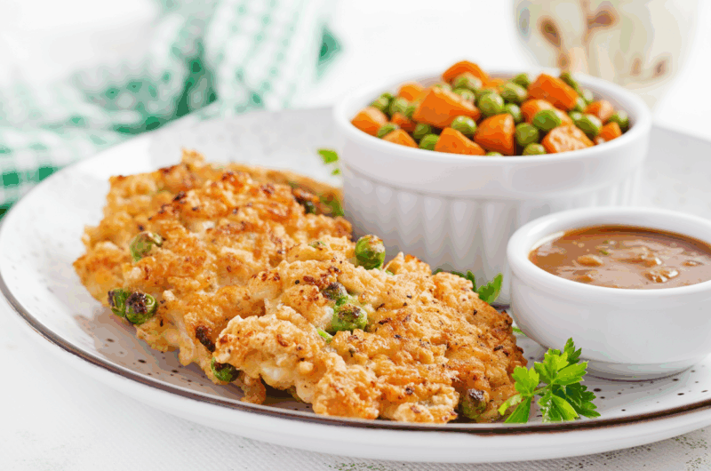 Pork Schnitzel with Baked Potato and Peas & Carrots